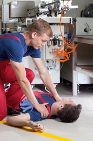 Unconscious man after accident in a factory